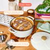 4 Quart Enameled Cast Iron Round Dutch Oven with Petal Design Lid, White Icing by Drew